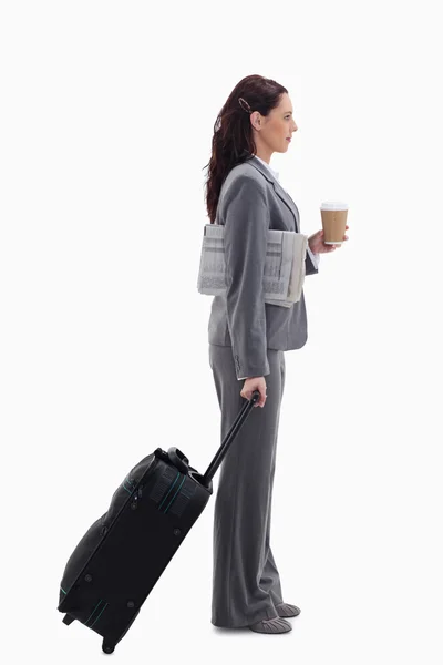 Perfil de uma mulher de negócios indo para uma viagem — Fotografia de Stock