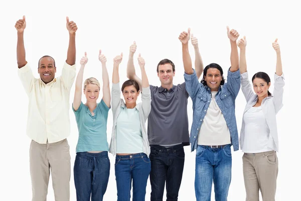 stock image raising their arms with the thumbs-up