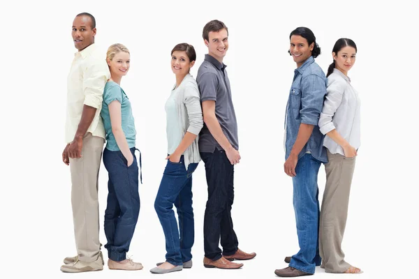 Three couples standing back to back — Stock Photo, Image