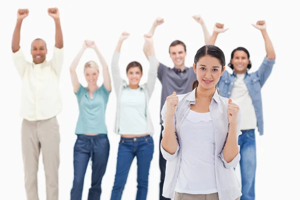 stock image Close-up of a woman clenching her fists with raising thei