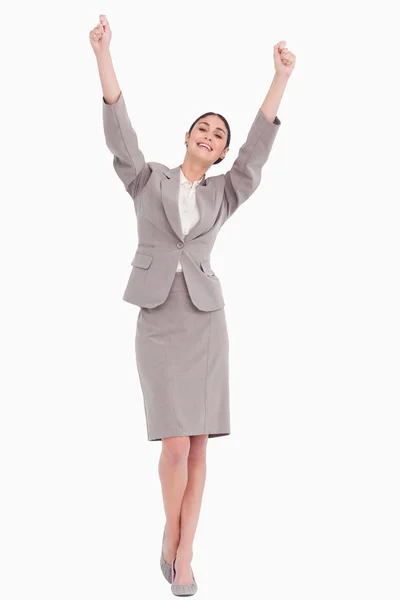 Молода бізнес-леді з піднятими руками — стокове фото
