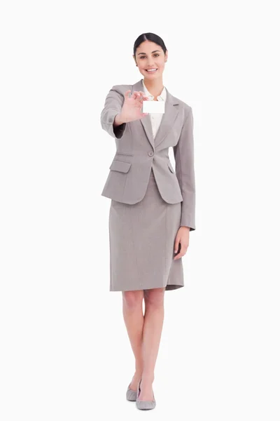 Young saleswoman showing her blank business card — Stock Photo, Image