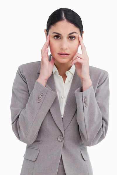 Young saleswoman with headache — Stock Photo, Image