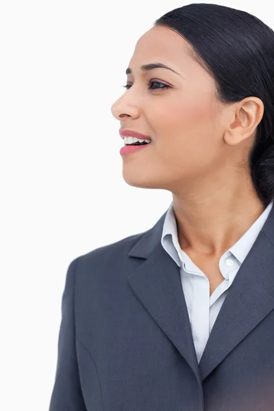 Close up of saleswoman looking to the side — Stock Photo, Image