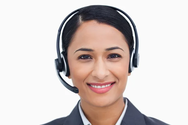 Close up of friendly smiling call center agent — Stock Photo, Image