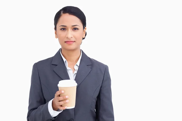 Close up of saleswoman with paper cup — Stock Photo, Image