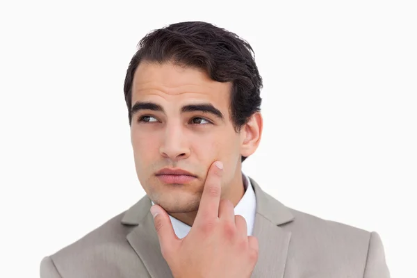 Close up of salesman in thoughts — Stock Photo, Image