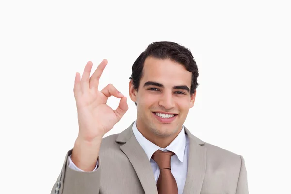 Close up of smiling salesman giving his approval — Stock Photo, Image
