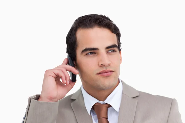 Close up of serious salesman on his cellphone — Stock Photo, Image