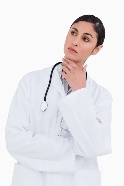 Thoughtful female doctor — Stock Photo, Image