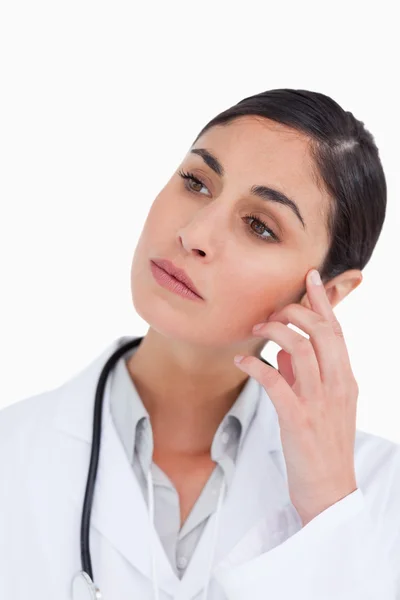 Close up of thoughtful female doctor — Stock Photo, Image