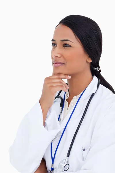 Närbild på kvinnliga läkare i tänkare pose — Stockfoto