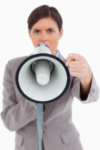 Close up of angry yelling entrepreneur with megaphone — Stock Photo, Image