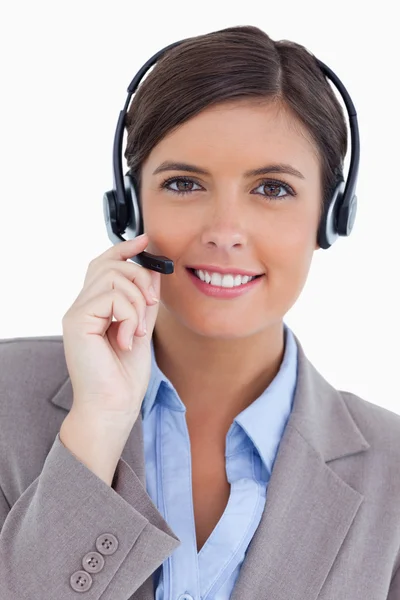 Agente de call center feminino com fone de ouvido — Fotografia de Stock
