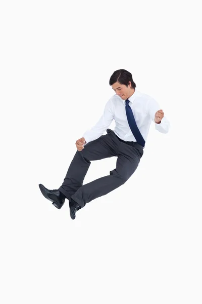 Successful tradesman clicking his heels — Stock Photo, Image