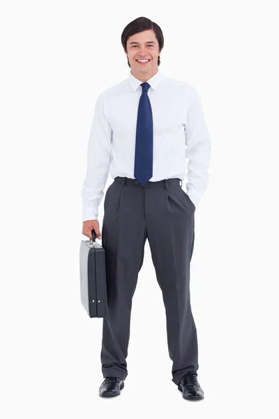 Comerciante sorridente com sua mala — Fotografia de Stock