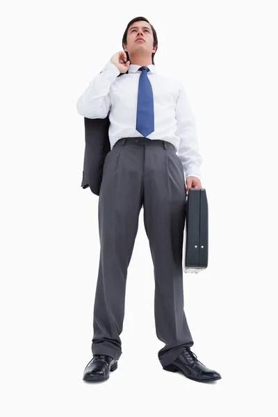 Confident tradesman with suitcase and jacket — Stock Photo, Image