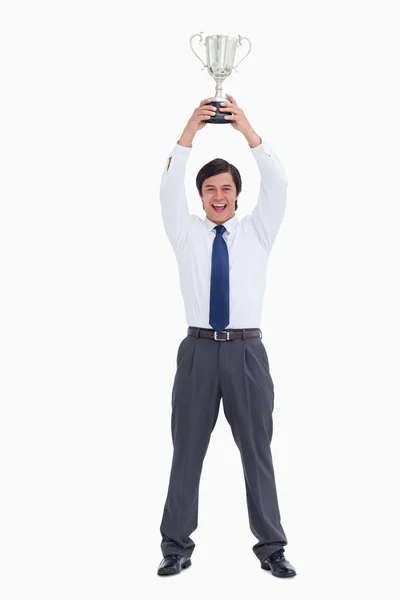 Successful tradesman holding cup — Stock Photo, Image