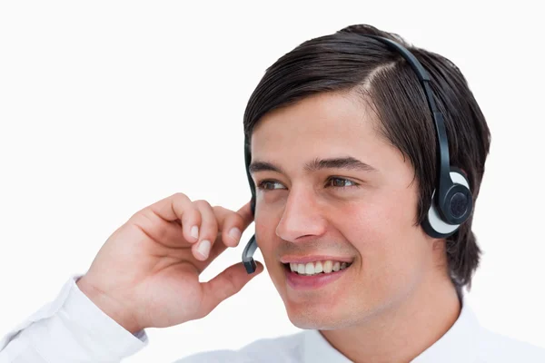Close up van mannelijke call center agent in een gesprek — Stockfoto