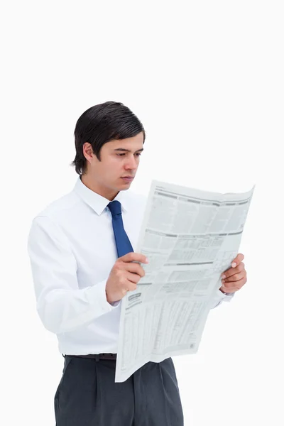 Young tradesman reading the news — Stock Photo, Image