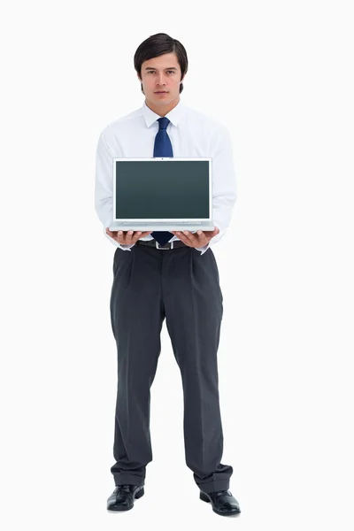 Handwerker präsentiert Bildschirm seines Laptops — Stockfoto