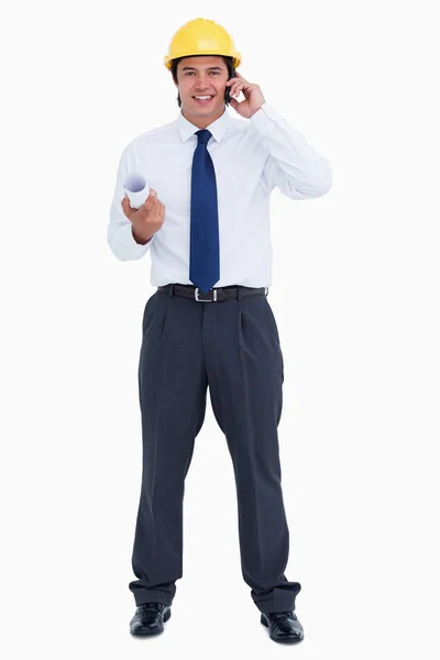 Smiling male architect on his cellphone — Stock Photo, Image