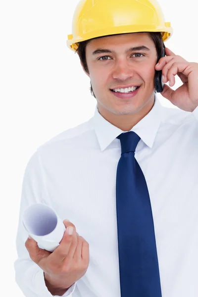 Close up of smiling male architect on his cellphone — Stock Photo, Image