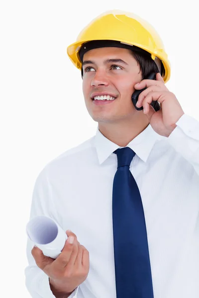 Close up of smiling architect talking on his cellphone — Stock Photo, Image