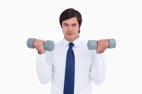 Tradesman lifting weights — Stock Photo, Image