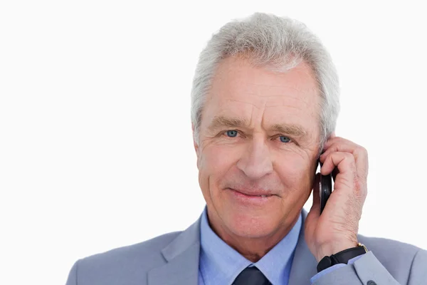 Close up of mature tradesman on his cellphone — Stock Photo, Image