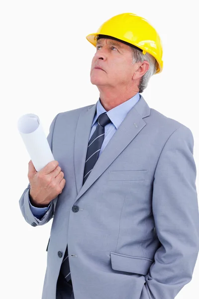 Close up of mature architect taking a close look — Stock Photo, Image