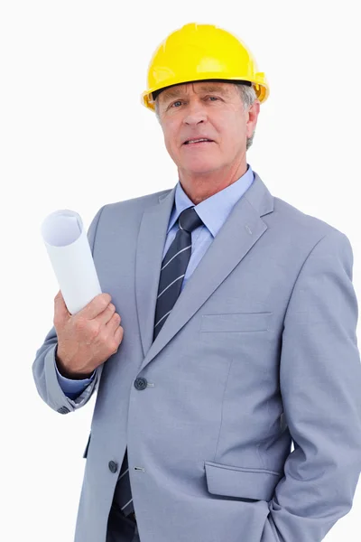Confident mature architect with helmet and plans — Stock Photo, Image