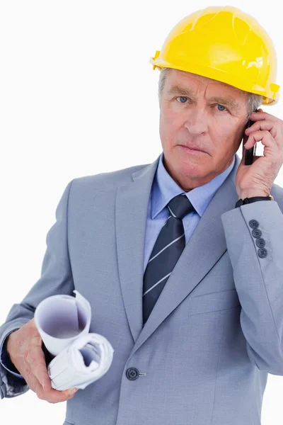 Serious mature architect on his cellphone — Stock Photo, Image