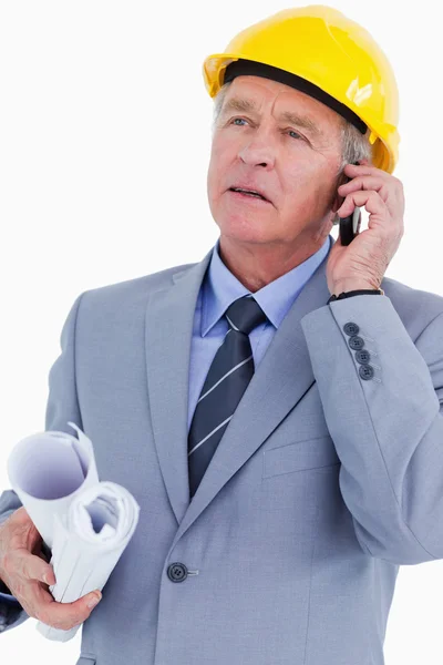 Mature architect on his mobile phone — Stock Photo, Image
