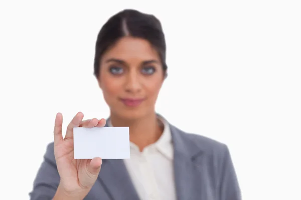 Female entrepreneur showing her business card — Stock Photo, Image