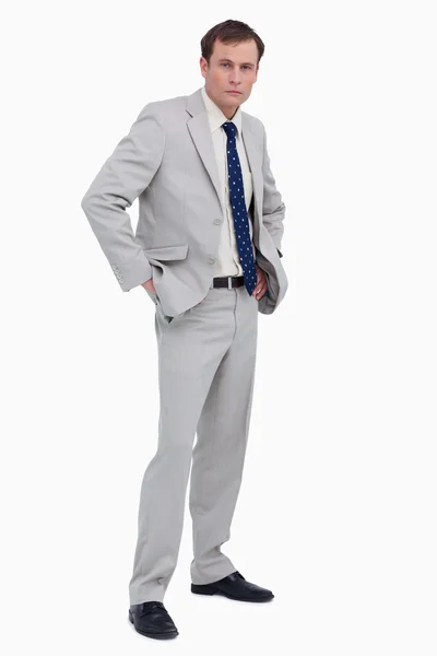 Businessman with hands in his pockets — Stock Photo, Image