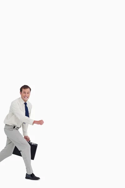 Empresário correndo com sua mala — Fotografia de Stock