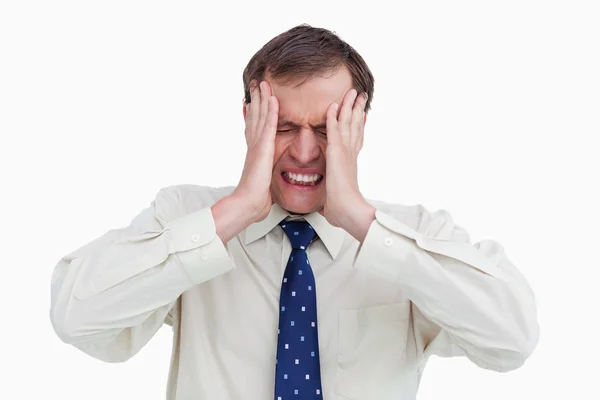 Närbild på affärsman med huvudvärk — Stockfoto