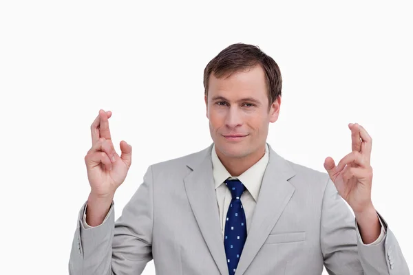 Close up de homem de negócios com os dedos cruzados — Fotografia de Stock