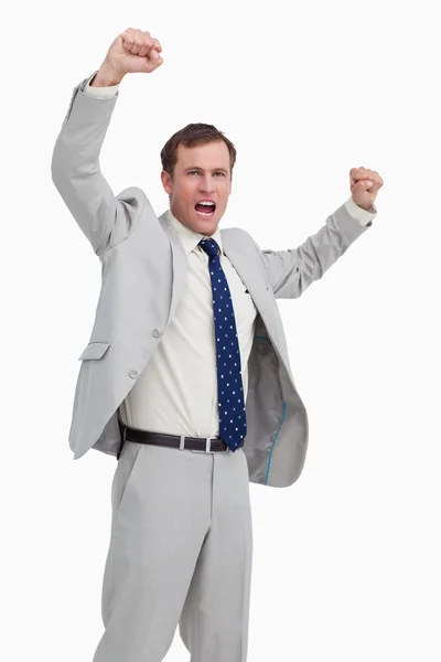 Celebrando a un hombre de negocios con los brazos en alto —  Fotos de Stock