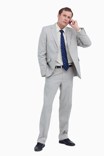 Businessman listening to caller — Stock Photo, Image