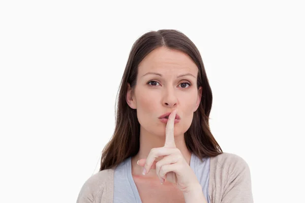 Kobieta prosi o ciszę — Zdjęcie stockowe