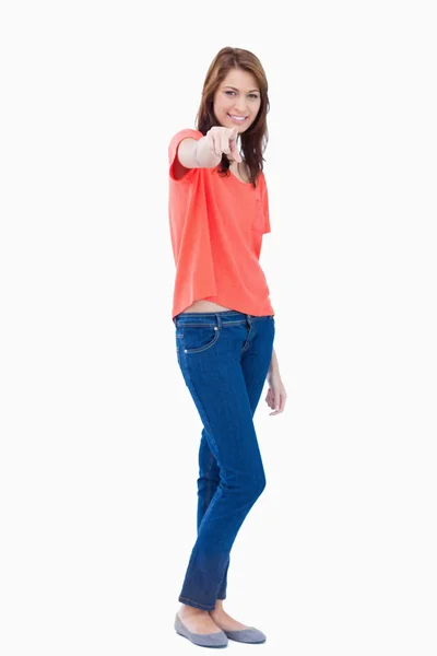 Teenager pointing to the camera with her finger — Stock Photo, Image