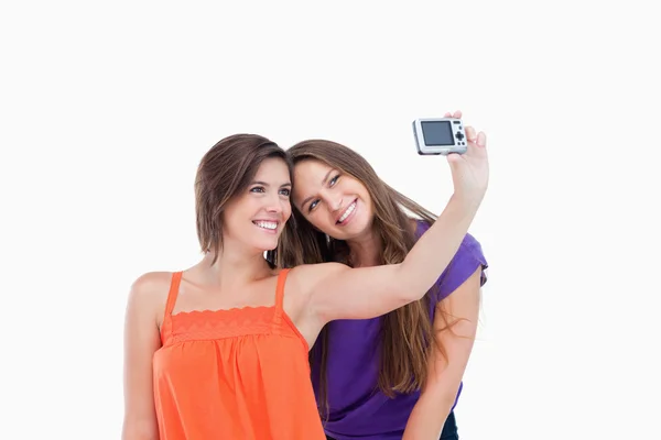 Teenage girl laying her head on her friend's shoulder — Stock Photo, Image
