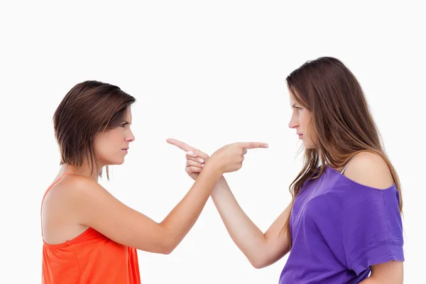 Teenagers pointing fingers on each other — Stock Photo, Image