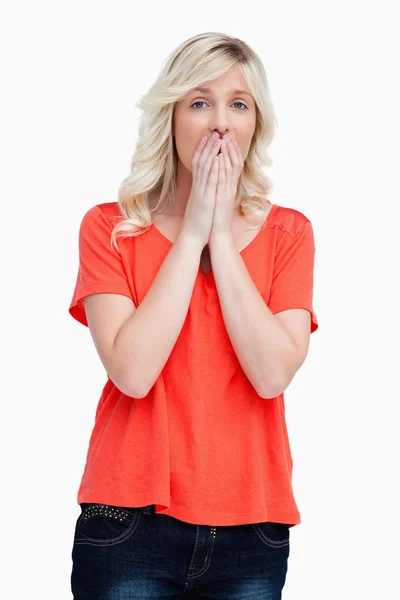 Teenager looking sad with her hands on her mouth — Stock Photo, Image