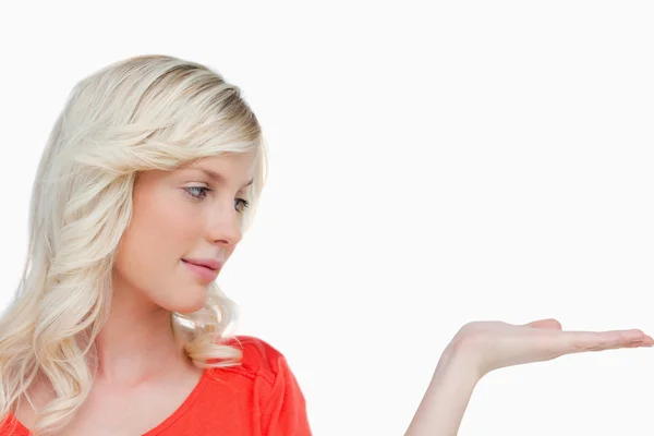 Beautiful woman placing her hand palm up — Stock Photo, Image