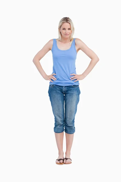 Blonde woman placing her hands on her hips — Stock Photo, Image
