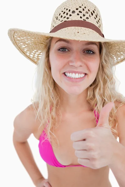 Smiling teenager putting her thumbs up — Stock Photo, Image