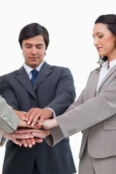 Hands of businesspeople forming a pile Royalty Free Stock Photos